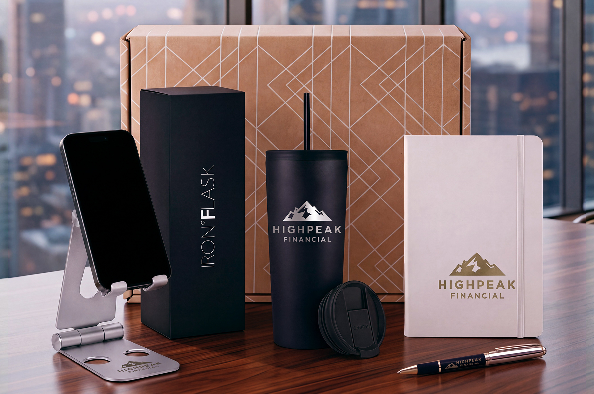 Remote employee welcome kit with branded apparel, drinkware, and a notebook